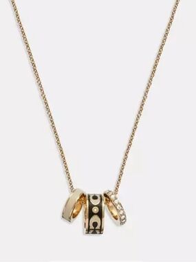 Coach Gold and Black Signature Enamel Rondell Necklace Multi-Ring Pendant